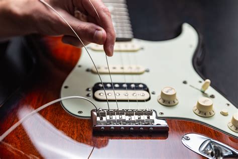 How Often Should Guitar Strings Be Changed: A Symphony of Maintenance and Madness